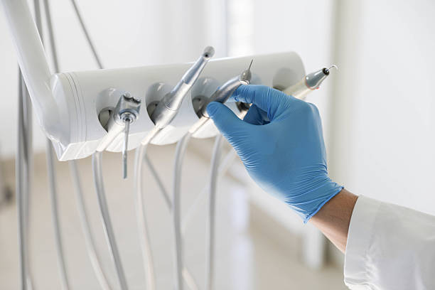 Professional Tooth Extraction technician working in Hastings, MI